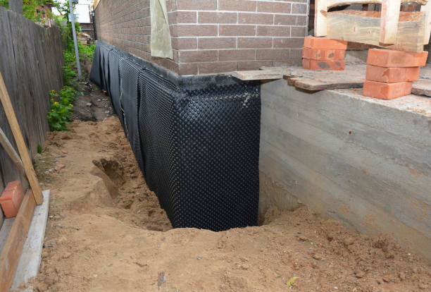 Happy homeowners after waterproofing job in Dahlgren